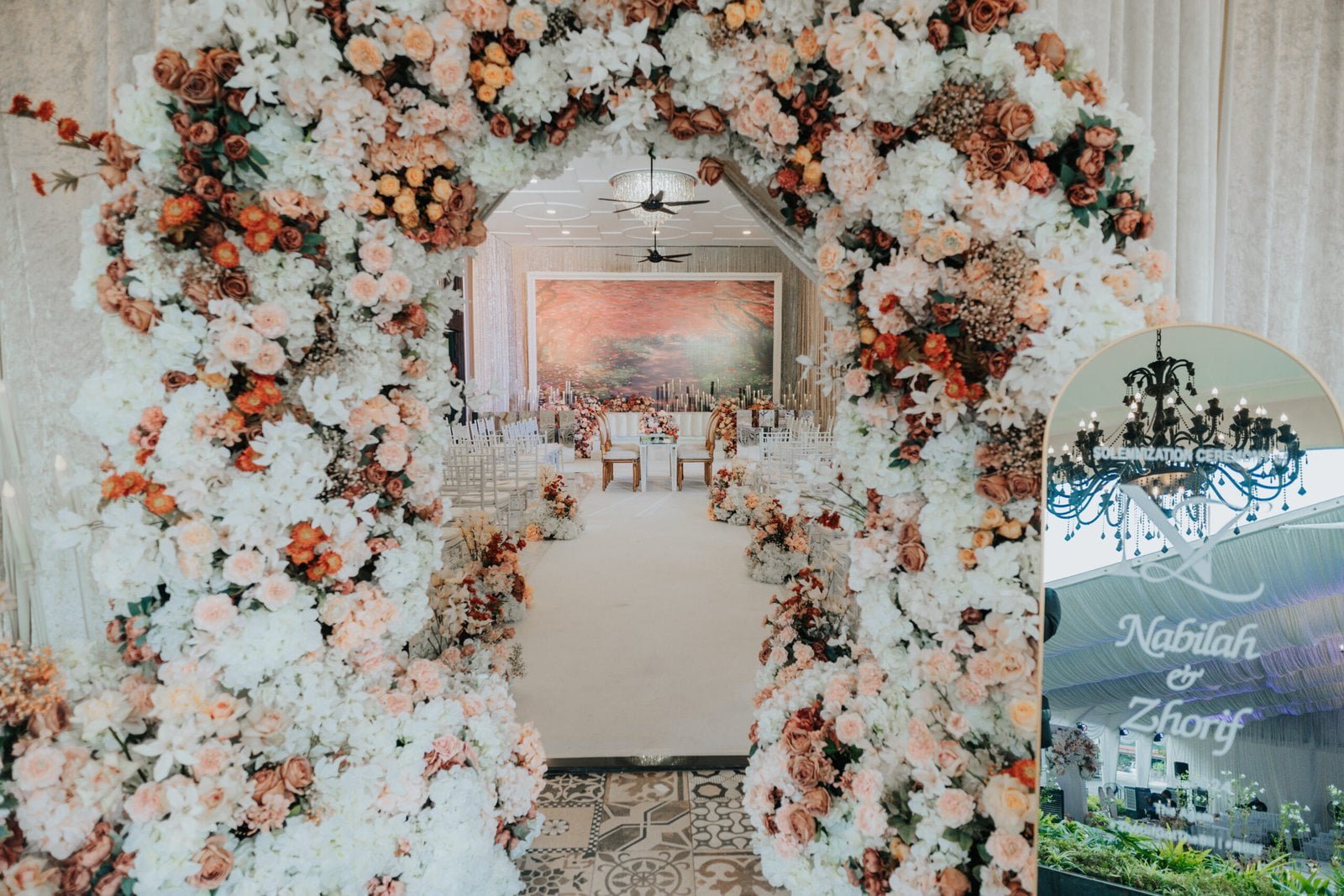 Elegant wedding arch decorated with floral arrangements leading to a solemnization ceremony setup at The Agam in Kuala Lumpur.